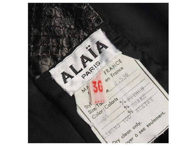 Alaïa Minigonna in pelle nera con stampa serpente e lacci Nero Stampa python - vista 3