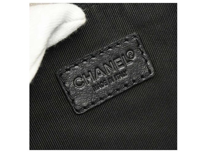 Borsa Chanel Surpique Zip Around in pelle trapuntata Medium Nero - vista 4