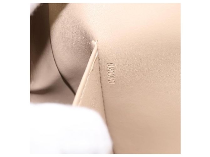 Louis Vuitton Thompson Street Monogram Vernis Medium Beige - vista 6