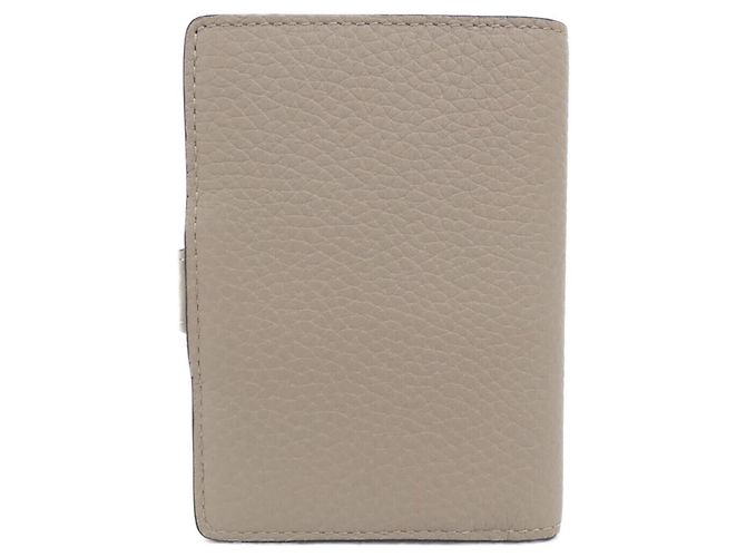 Cartera Compacta Louis Vuitton Taurillon LV Vertical - vista 2