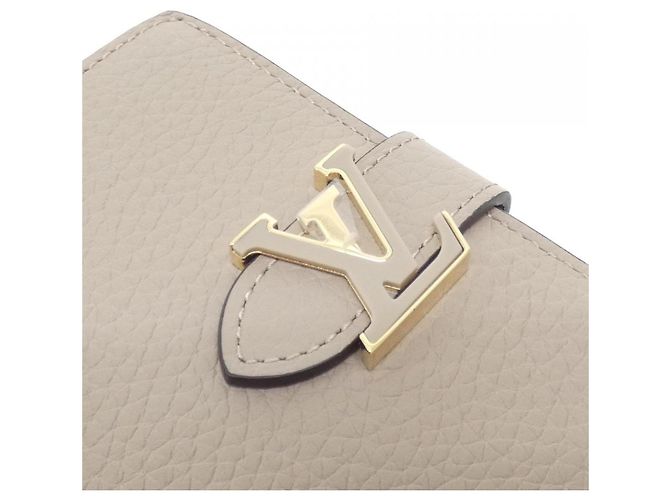 Cartera Compacta Louis Vuitton Taurillon LV Vertical - vista 4