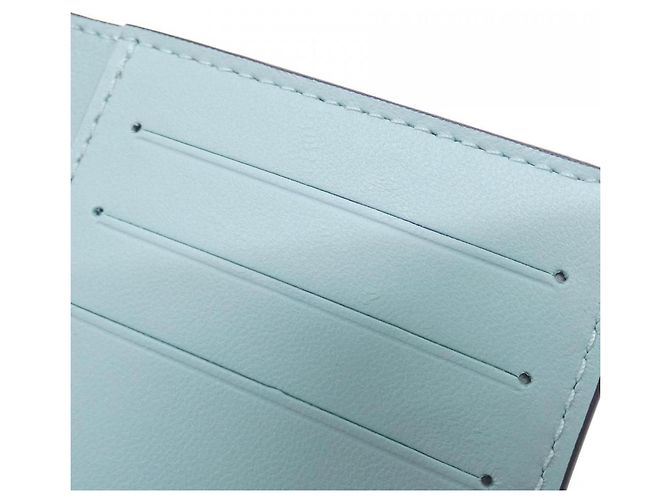 Cartera Compacta Louis Vuitton Taurillon LV Vertical - vista 7