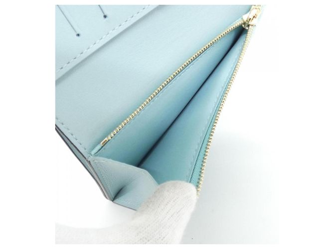 Cartera Compacta Louis Vuitton Taurillon LV Vertical - vista 8
