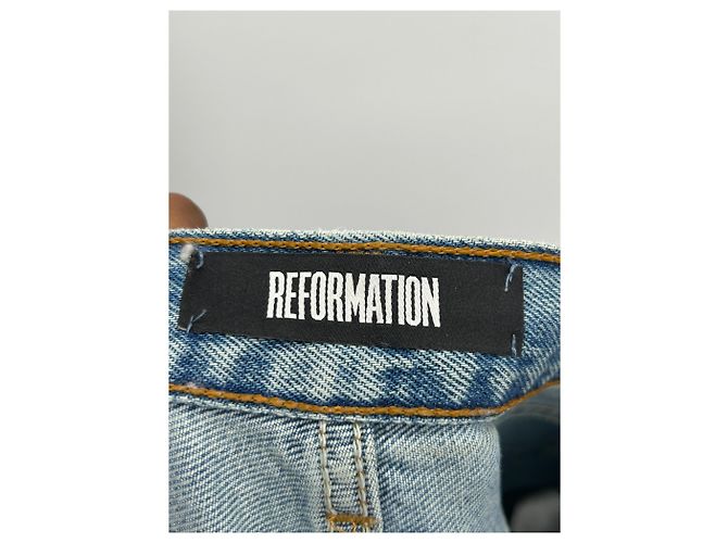 Vaqueros Reformation azules de algodón con detalles de agujeros - vista 3