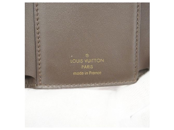 Cartera Louis Vuitton Portefeuille Capucines Compact Plegable - vista 4