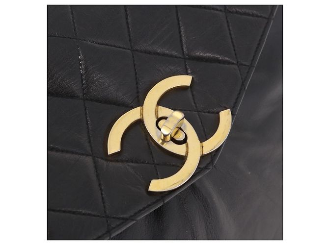 Borsa CHANEL Matelasse in pelle di agnello nera e oro CC Auth 183326A Nero D'oro - vista 17