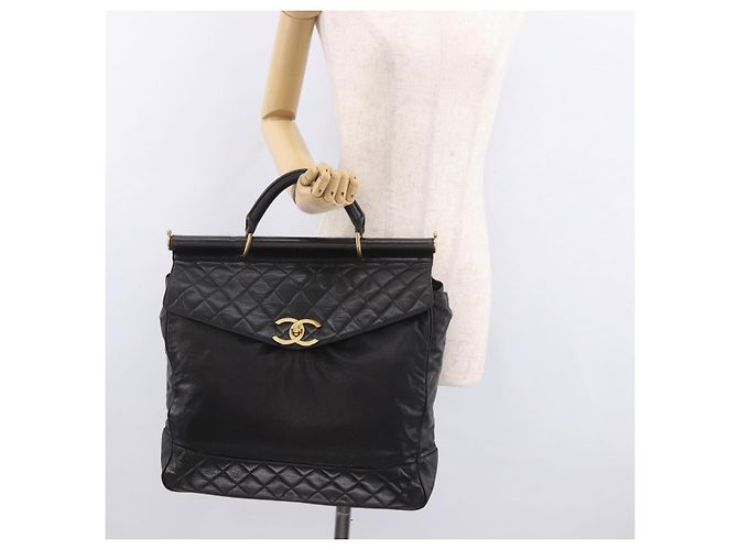 Borsa CHANEL Matelasse in pelle di agnello nera e oro CC Auth 183326A Nero D'oro - vista 24