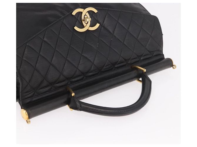 Borsa CHANEL Matelasse in pelle di agnello nera e oro CC Auth 183326A Nero D'oro - vista 6