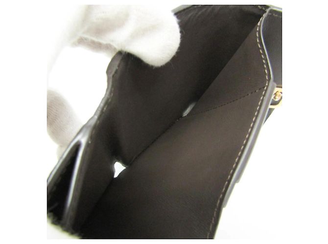 Carteira Louis Vuitton Taurillon Capucines XS Bege - vista 12