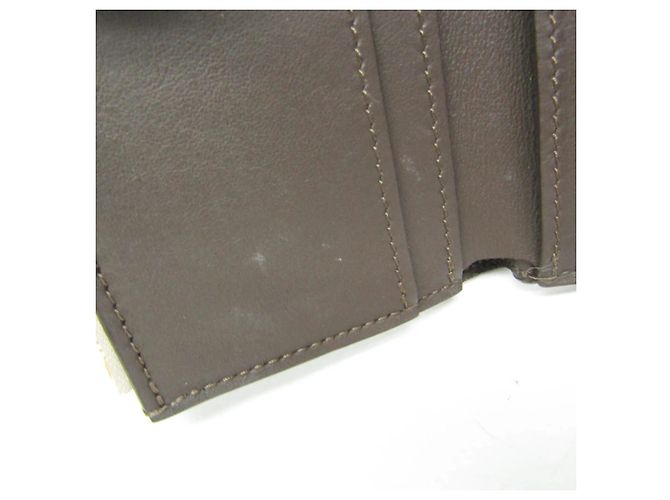 Carteira Louis Vuitton Taurillon Capucines XS Bege - vista 13