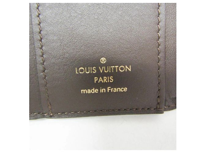 Carteira Louis Vuitton Taurillon Capucines XS Bege - vista 15