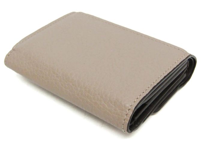 Carteira Louis Vuitton Taurillon Capucines XS Bege - vista 3