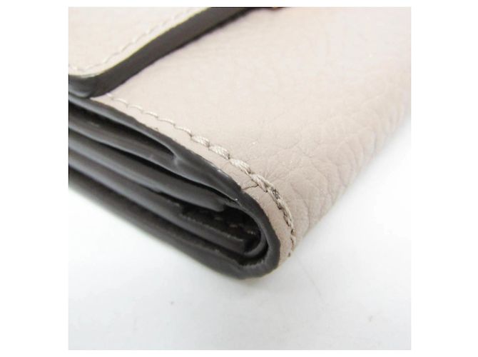 Carteira Louis Vuitton Taurillon Capucines XS Bege - vista 7