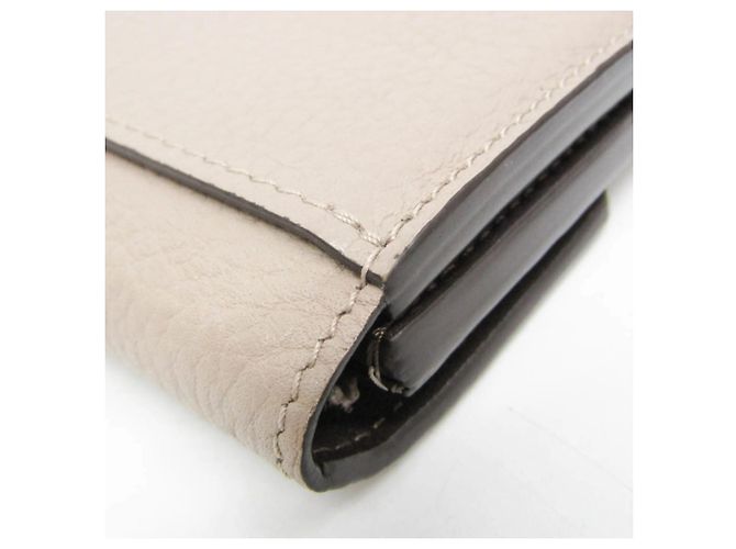 Carteira Louis Vuitton Taurillon Capucines XS Bege - vista 9