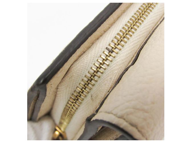 Cartera Compacta Louis Vuitton Monogram Empreinte Métis Crudo Blanco roto - vista 9