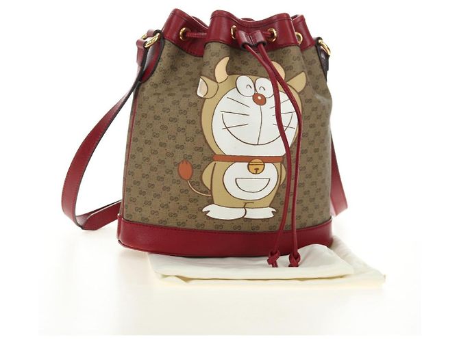 Bolso GUCCI Micro GG Supreme Doraemon x Fujiko-Pro en PVC Beige 655597 Auth 183006M Dorado - vista 12