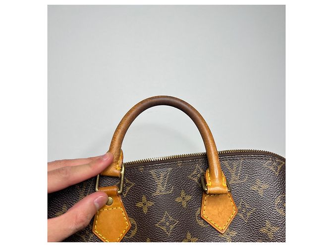 Bolsa Louis Vuitton Alma Monogram Marrom - vista 10