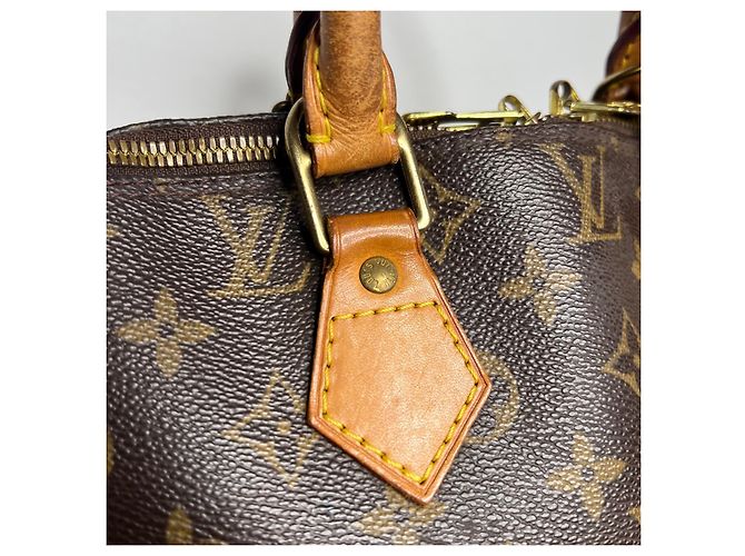 Bolsa Louis Vuitton Alma Monogram Marrom - vista 3