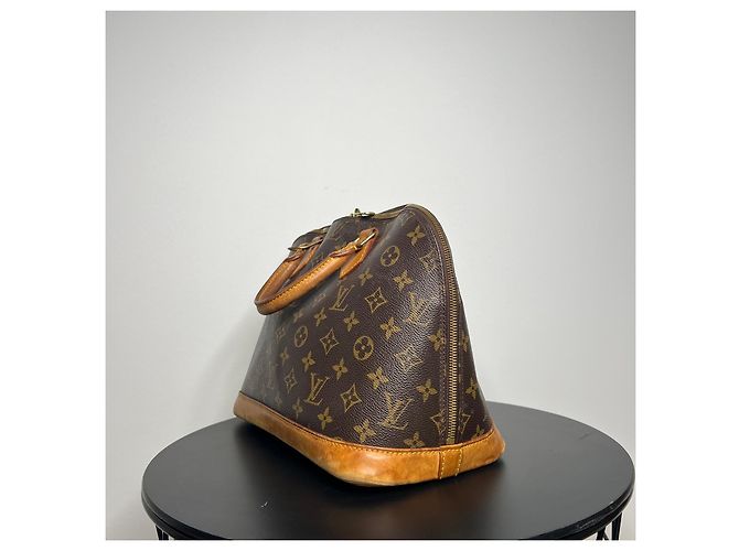 Bolsa Louis Vuitton Alma Monogram Marrom - vista 6