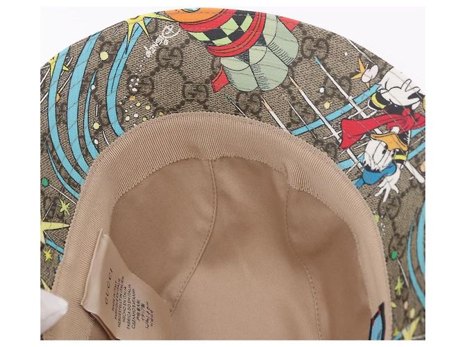 Cappello GUCCI GG Supreme Disney Donald Duck in PVC Beige Auth BA13368SM - vista 12