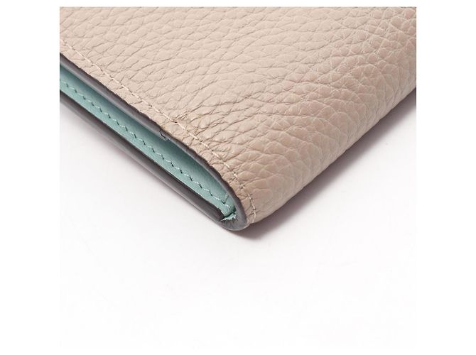 Louis Vuitton Bi-fold Long Wallet aus beige Leder - Ansicht 10