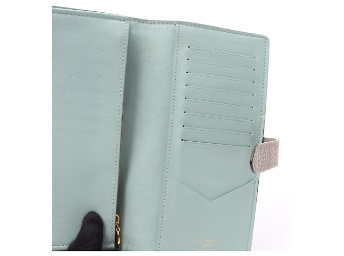 Louis Vuitton Bi-fold Long Wallet aus beige Leder - Ansicht 9