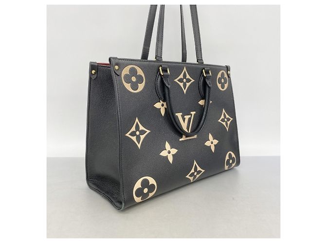 Borsa Tote Louis Vuitton Monogram Empreinte Bicolor OnTheGo MM Nero Beige - vista 2