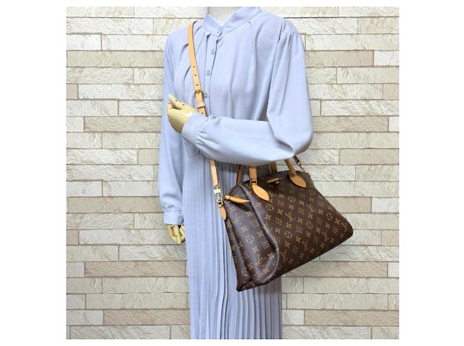 Borsa a tracolla Louis Vuitton Rivoli MM Monogram Marrone - vista 2
