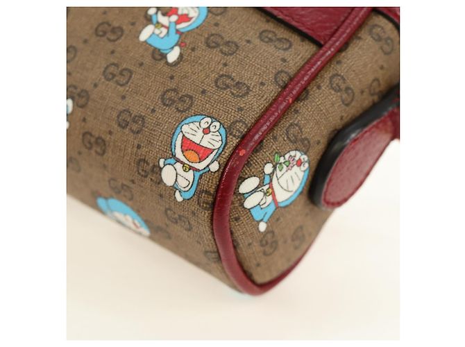 Borsa GUCCI Collaborazione Doraemon Micro GG Supreme PVC Beige 647784 Auth 184387M D'oro - vista 12