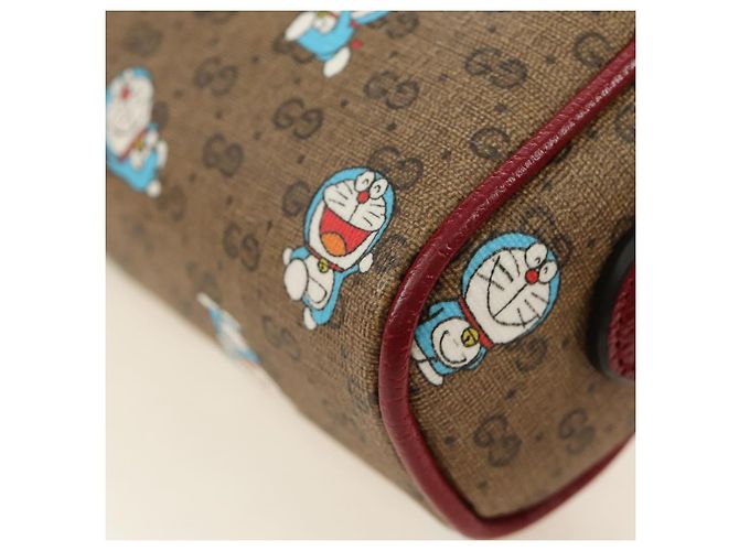 Borsa GUCCI Collaborazione Doraemon Micro GG Supreme PVC Beige 647784 Auth 184387M D'oro - vista 14