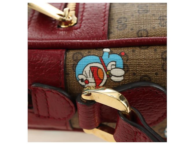 Borsa GUCCI Collaborazione Doraemon Micro GG Supreme PVC Beige 647784 Auth 184387M D'oro - vista 18