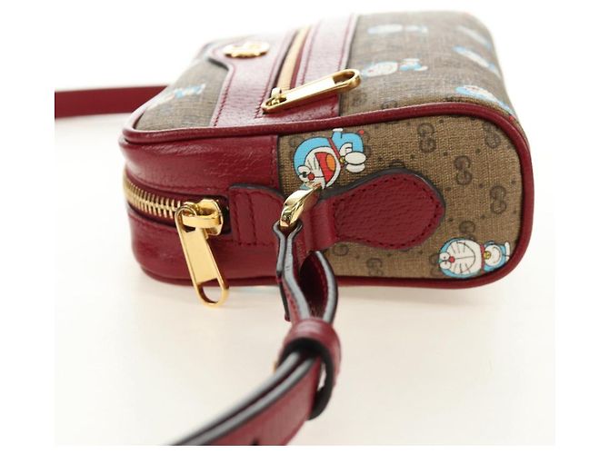 Borsa GUCCI Collaborazione Doraemon Micro GG Supreme PVC Beige 647784 Auth 184387M D'oro - vista 4