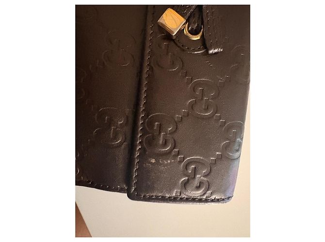 Gucci Cartera larga de cuero marrón con relieve GG Castaño - vista 4