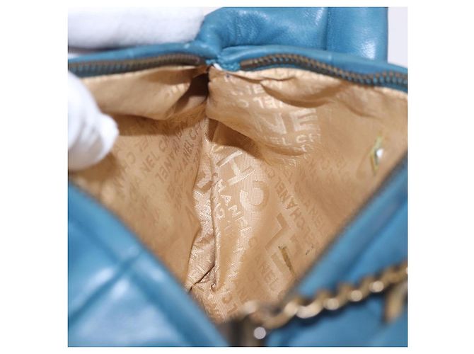 Bolsa de Alça de Corrente CHANEL em Pele de Cordeiro Azul e Ouro CC Auth 185410SAM Dourado - vista 20