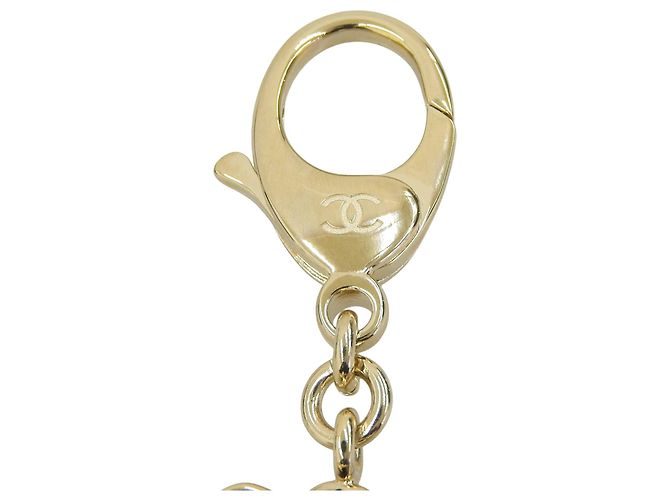 Portachiavi Chanel B25B Coco Mark Camellia Nero D'oro - vista 7