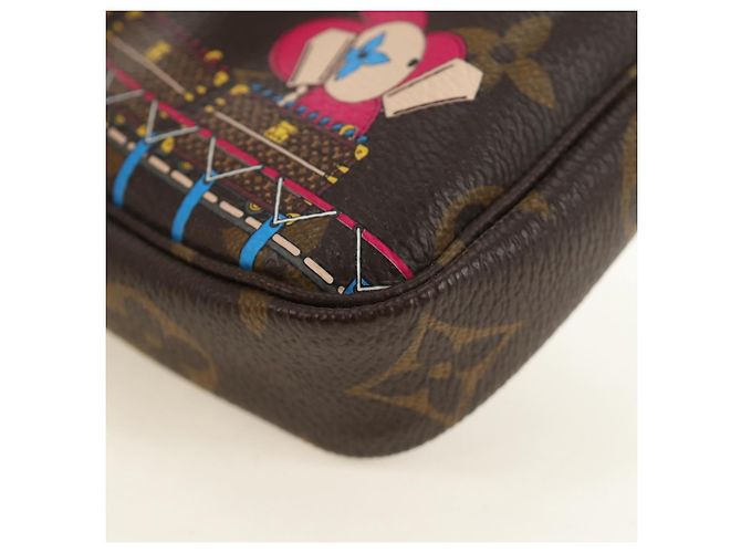 LOUIS VUITTON Monogram Vivienne Mini Pochette Accessoires M69752 Auth 184588SAM Monograma - vista 15