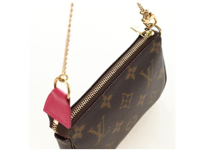 LOUIS VUITTON Monogram Vivienne Mini Pochette Accessoires M69752 Auth 184588SAM Monograma - vista 6