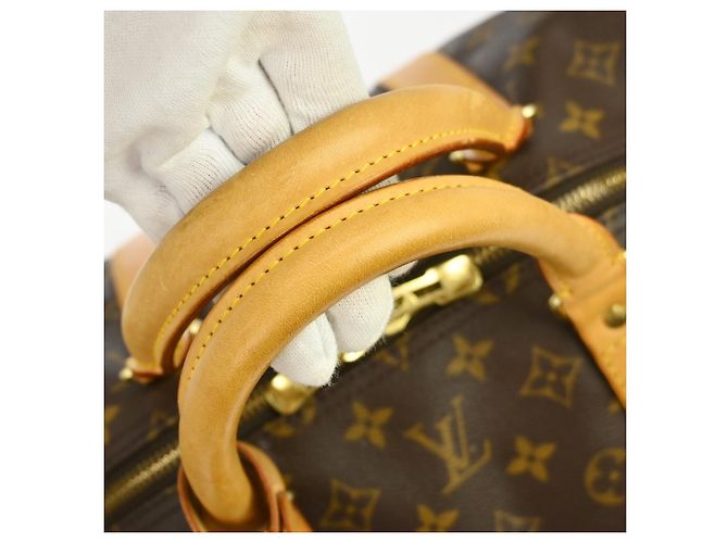Borsa Louis Vuitton Keepall in tela Monogram 55 Marrone - vista 6