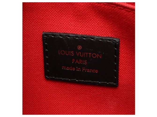 Louis Vuitton Marrone Monogram Reverse Giant OnTheGo PM - vista 4