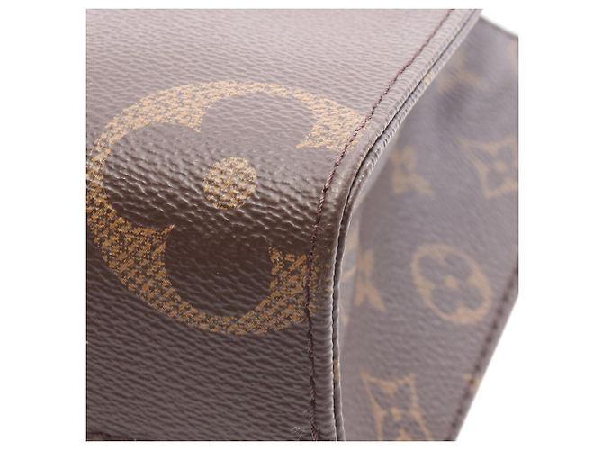 Louis Vuitton Marrone Monogram Reverse Giant OnTheGo PM - vista 6