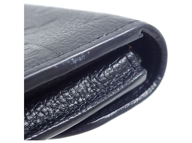 Monedero Monogram Empreinte Louis Vuitton Negro - vista 3