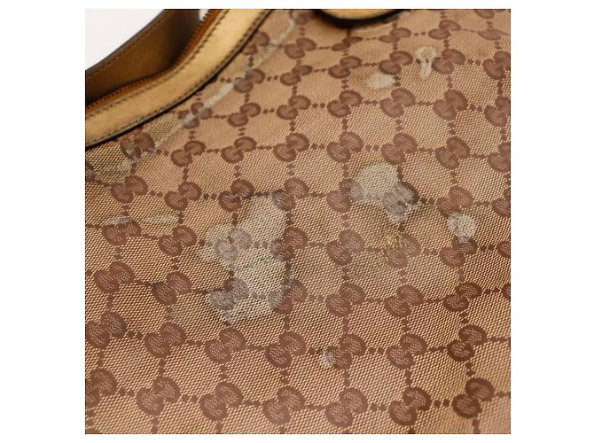 Gucci Borsa Hobo Monogram GG Heart Charm Marrone D'oro - vista 11