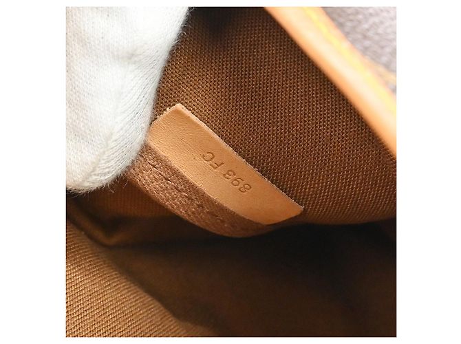 Louis Vuitton Saumur Monogram Canvas 35 Marrone - vista 4