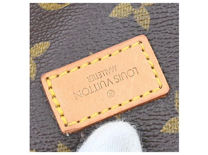 Louis Vuitton Saumur Monogram Canvas 35 Marrone - vista 5