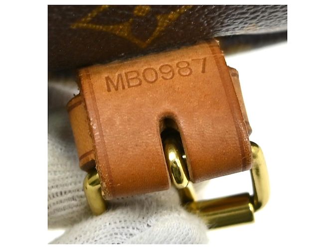 Louis Vuitton Saumur Monogram Canvas 35 Marrone - vista 4