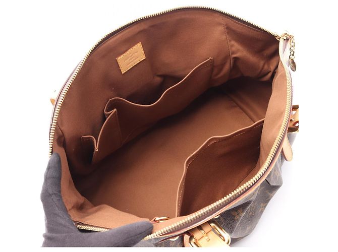 Borsa Louis Vuitton Tivoli GM Marrone Monogramma - vista 3