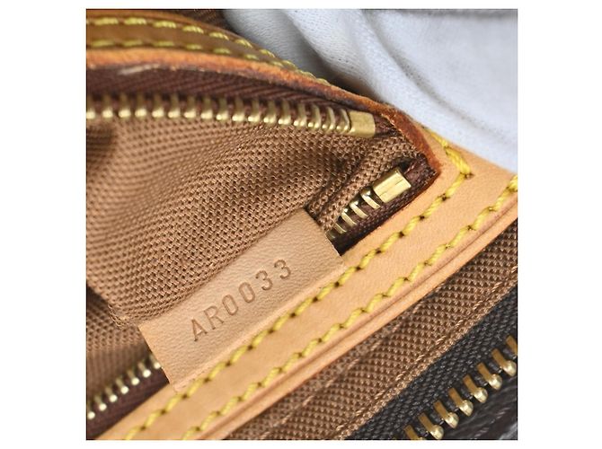 Louis Vuitton Trotteur Monogram Canvas Marrone - vista 7