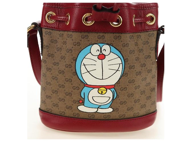 GUCCI GUCCI �~ Doraemon Micro GG Supreme Bag PVC Beige Oro 647801 Auth 185900M D'oro - vista 3