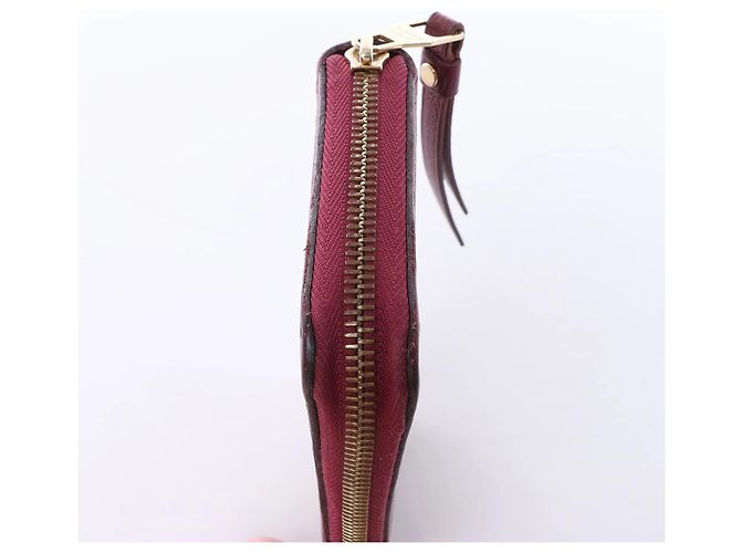 Cartera de cuero Louis Vuitton Zippy Empreinte roja M62214 - vista 3