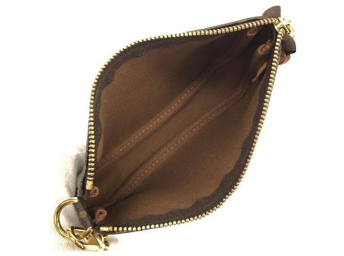 Louis Vuitton Monogram Mini Pochette Accessoires Marrone - vista 6
